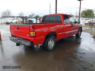2004 GMC Sierra 1500 SLE with VIN 2GTEC19T441280693, listed as a IAAI auction lot 41796201 with 128,898 mi miles. Bid and sale history available at carsss.com. Image 4.