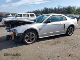 2004 Ford Mustang GT Deluxe with VIN 1FAFP42X74F208831, listed as a Copart auction lot 62903735 with 44,279 mi miles and Clean title. Bid and sale history available at DreamBid. Image 1.