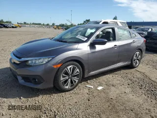 2016 Honda Civic EX-T with VIN 19XFC1F34GE012064, listed as a Copart auction lot 63016995 with 97,771 mi miles and Clean title. Bid and sale history available at DreamBid. Image 1.