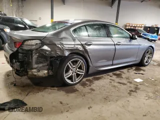 2013 BMW 6 Series 650i xDrive z VIN WBA6B4C56DD098658, wystawiony jako Copart lot #55408535 z przebiegiem 72 964 mil mil oraz Szkoda całkowita • Salvage title. Historia ofert i sprzedaży dostępna na DreamBid. Obrazek 3.