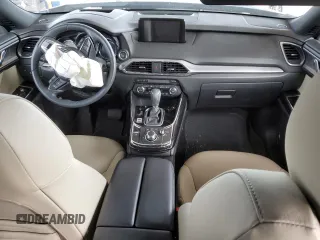 2018 Mazda CX-9 Grand Touring z VIN JM3TCADY2J0220873, wystawiony jako Copart lot #49264875 z przebiegiem Nie podano mil oraz Szkoda całkowita • Salvage title. Historia ofert i sprzedaży dostępna na DreamBid. Obrazek 8.