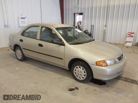 1997 Mazda Protege DX z VIN JM1BC1415V0133823, wystawiony jako IAAI lot #42091960 z przebiegiem 149 959 mil mil oraz . Historia ofert i sprzedaży dostępna na DreamBid. Obrazek 1.