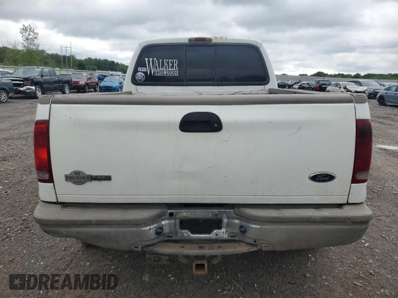 2002 Ford Super Duty F-250 XL with VIN 1FTNW21F72ED46989, listed as a Copart auction lot 57978304 with 0 mi miles and Salvage Title. Bid and sale history available at carsss.com. Image 6.