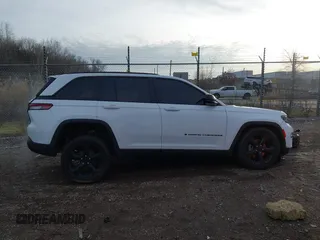 2023 Jeep Grand Cherokee Laredo with VIN 1C4RJHAG6PC620620, listed as a IAAI auction lot 41086775 with 17,882 mi miles and . Bid and sale history available at DreamBid. Image 14.