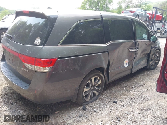 2015 Honda Odyssey Touring Elite with VIN 5FNRL5H93FB106046, listed as a IAAI auction lot 42492096 with 197,575 mi miles and . Bid and sale history available at DreamBid. Image 4.