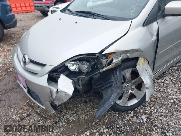 2007 Mazda 5 Touring with VIN JM1CR29L570139627, listed as a IAAI auction lot 41153270 with 90,228 mi miles and . Bid and sale history available at carsss.com. Image 6.