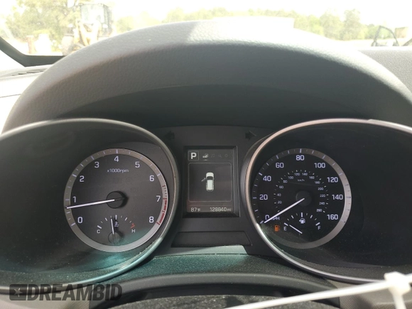 2018 Hyundai Santa Fe 2.4L z VIN 5NMZUDLB9JH095157, wystawiony jako Copart lot #53546725 z przebiegiem 128 840 mil mil oraz Szkoda całkowita • Salvage title. Historia ofert i sprzedaży dostępna na DreamBid. Obrazek 9.