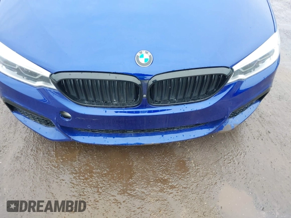 2018 BMW 5 Series 540i xDrive with VIN WBAJE7C5XJWC56733, listed as a IAAI auction lot 41558451 with 67,460 mi miles and . Bid and sale history available at DreamBid. Image 6.