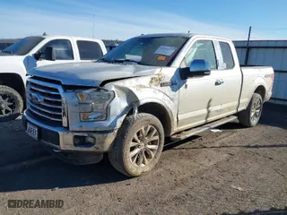 2015 Ford F-150 XLT with VIN 1FTFX1EF4FKE71784, listed as a IAAI auction lot 41666937 with 112,117 mi miles. Bid and sale history available at carsss.com. Image 2.