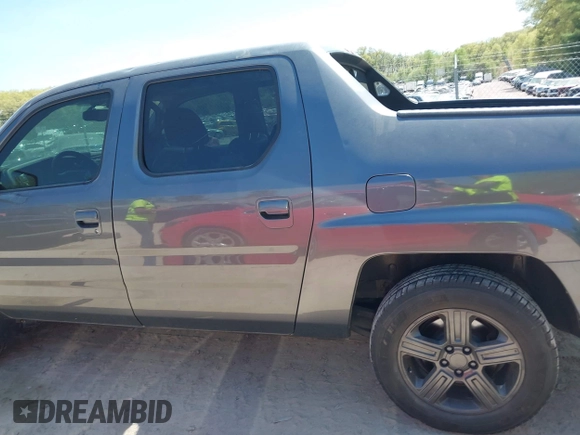 2013 Honda Ridgeline RTL with VIN 5FPYK1F58DB016600, listed as a IAAI auction lot 42237719 with 86,034 mi miles and . Bid and sale history available at DreamBid. Image 14.