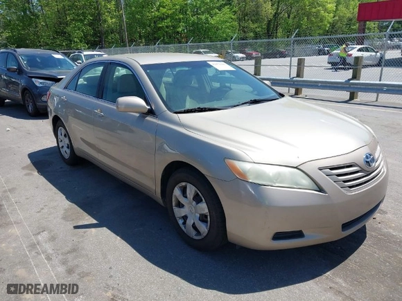 2009 Toyota Camry with VIN 4T1BE46K69U412662, listed as a IAAI auction lot 42072105 with 184,410 mi miles. Bid and sale history available at carsss.com. Image 1.