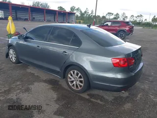 2014 Volkswagen Jetta SE with VIN 3VWD07AJ9EM277085, listed as a IAAI auction lot 42531957 with 171,613 mi miles and . Bid and sale history available at DreamBid. Image 3.