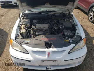 1999 Pontiac Grand Am GT with VIN 1G2NW12E0XM853038, listed as a Copart auction lot 69262194 with 162,986 mi miles and Salvage Title. Bid and sale history available at carsss.com. Image 11.