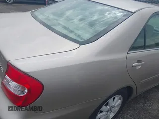 2003 Toyota Camry LE with VIN 4T1BE30K73U248560, listed as a IAAI auction lot 41889516 with 179,961 mi miles and . Bid and sale history available at DreamBid. Image 6.