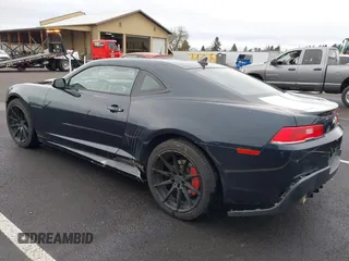 2014 Chevrolet Camaro LT z VIN 2G1FB1E3XE9265155, wystawiony jako IAAI lot #41227609 z przebiegiem 104 786 mil mil oraz . Historia ofert i sprzedaży dostępna na DreamBid. Obrazek 3.