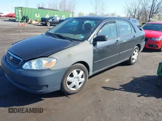 2007 Toyota Corolla CE with VIN JTDBR32E970109561, listed as a IAAI auction lot 41992222 with 199,407 mi miles. Bid and sale history available at carsss.com. Image 2.