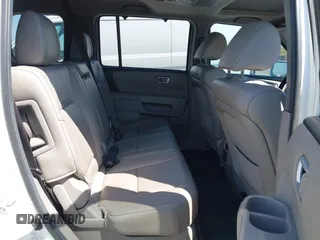 2013 Honda Pilot Touring with VIN 5FNYF4H92DB031589, listed as a IAAI auction lot 42159313 with 192,604 mi miles and . Bid and sale history available at carsss.com. Image 8.