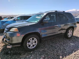2006 Acura MDX Touring w/Navi with VIN 2HNYD18866H512433, listed as a Copart auction lot 50182535 with 306,233 mi miles and Salvage Title. Bid and sale history available at carsss.com. Image 1.