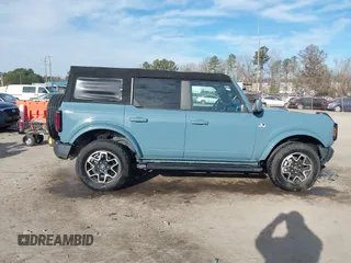 2022 Ford Bronco z VIN 1FMDE5DH0NLB77892, wystawiony jako IAAI lot #41466172 z przebiegiem 38 709 mil mil oraz . Historia ofert i sprzedaży dostępna na DreamBid. Obrazek 13.