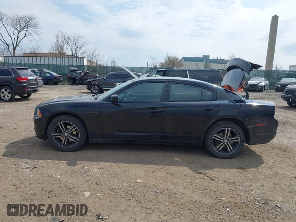 2014 Dodge Charger SXT Plus with VIN 2C3CDXJG2EH184239, listed as a IAAI auction lot 41912384 with 128,313 mi miles. Bid and sale history available at carsss.com. Image 15.