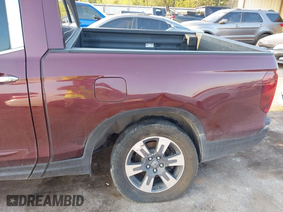 2017 Honda Ridgeline RTL-E with VIN 5FPYK3F74HB029959, listed as a IAAI auction lot 40530840 with 95,596 mi miles and . Bid and sale history available at DreamBid. Image 6.