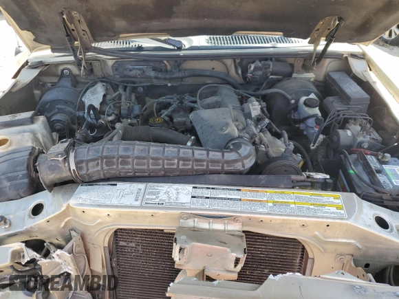 2000 Ford Explorer z VIN 1FMDU62X4YZA34304, wystawiony jako Copart lot #72740164 z przebiegiem 222 547 mil mil oraz Szkoda całkowita • Salvage title. Historia ofert i sprzedaży dostępna na DreamBid. Obrazek 12.