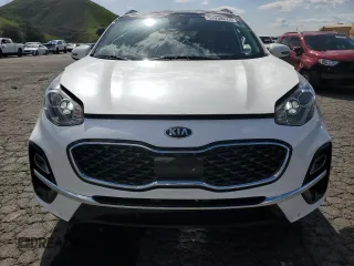 2020 Kia Sportage EX z VIN KNDPNCAC0L7805972, wystawiony jako Copart lot #52038825 z przebiegiem 65 794 mil mil oraz Szkoda całkowita • Salvage title. Historia ofert i sprzedaży dostępna na DreamBid. Obrazek 5.
