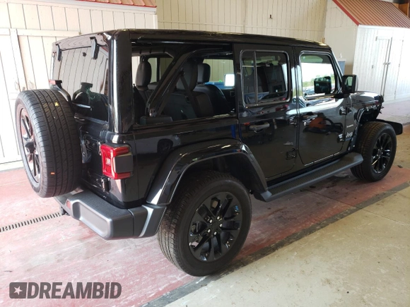 2023 Jeep Wrangler Sahara with VIN 1C4JJXP65PW627241, listed as a Copart auction lot 62873313 with 9,219 mi miles and Clean Title. Bid and sale history available at DreamBid. Image 3.