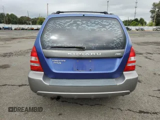2003 Subaru Forester XS with VIN JF1SG656X3H700009, listed as a Copart auction lot 71077514 with 249,471 mi miles and Salvage Title. Bid and sale history available at carsss.com. Image 6.