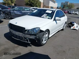 2014 Mercedes-Benz C C 250 Sport with VIN WDDGF4HB3EA965176, listed as a IAAI auction lot 41870150 with 211,085 mi miles. Bid and sale history available at carsss.com. Image 2.