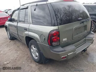 2003 Chevrolet TrailBlazer LT with VIN 1GNDT13S032331673, listed as a IAAI auction lot 42042418 with 220,976 mi miles. Bid and sale history available at carsss.com. Image 3.