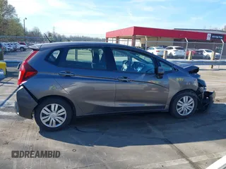 2017 Honda Fit LX with VIN JHMGK5H57HS007726, listed as a IAAI auction lot 41834608 with 97,442 mi miles. Bid and sale history available at carsss.com. Image 13.