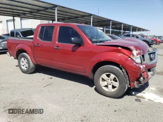 2013 Nissan Frontier SV with VIN 1N6AD0EV7DN711083, listed as a Copart auction lot 55882135 with 130,017 mi miles and Salvage title. Bid and sale history available at DreamBid. Image 4.