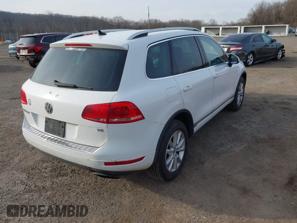 2013 Volkswagen Touareg Exec с VIN WVGEF9BP0DD006992, выставлен на аукционе IAAI как лот 41800140 с пробегом 177 299 миль миль и . История ставок и продаж доступна на DreamBid. Изображение 4.