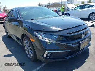 2019 Honda Civic EX z VIN 19XFC1F3XKE215534, wystawiony jako IAAI lot #42100714 z przebiegiem 31 808 mil mil oraz . Historia ofert i sprzedaży dostępna na DreamBid. Obrazek 1.