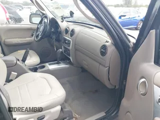 2003 Jeep Liberty Limited with VIN 1J4GK58K13W719457, listed as a IAAI auction lot 42088672 with 179,214 mi miles and . Bid and sale history available at carsss.com. Image 5.
