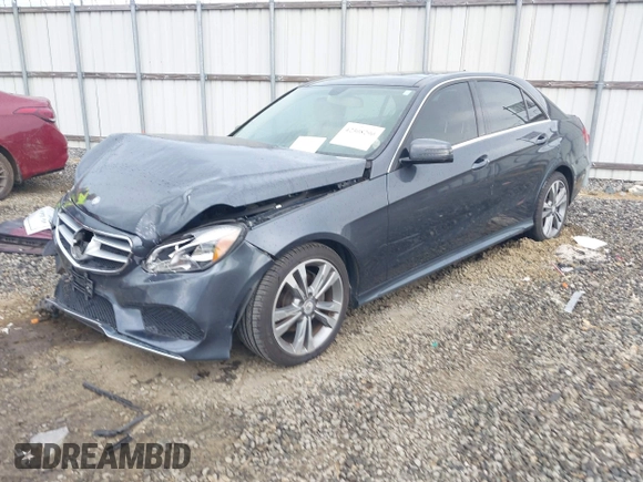 2014 Mercedes-Benz E 350 Sport with VIN WDDHF5KB7EA779952, listed as a IAAI auction lot 42308290 with 100,000 mi miles and . Bid and sale history available at DreamBid. Image 2.