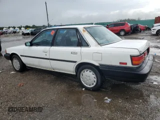 1991 Toyota Camry z VIN JT2SV21E2M3435406, wystawiony jako Copart lot #74958494 z przebiegiem 127 580 mil mil oraz Szkoda całkowita • Salvage title. Historia ofert i sprzedaży dostępna na DreamBid. Obrazek 2.