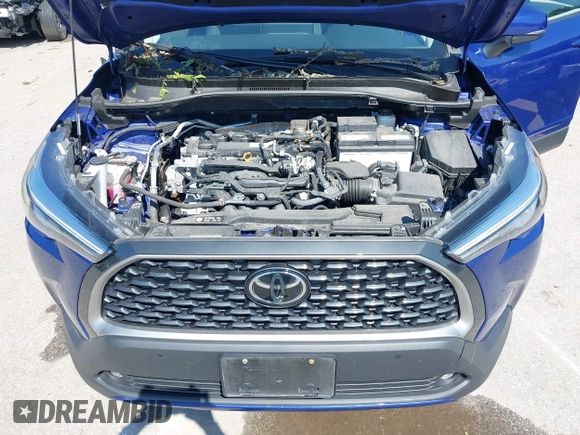 2022 Toyota Corolla Cross XLE z VIN 7MUDAABG4NV004836, wystawiony jako IAAI lot #42546573 z przebiegiem 23 821 mil mil oraz . Historia ofert i sprzedaży dostępna na DreamBid. Obrazek 10.