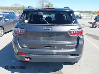 2019 Jeep Compass Trailhawk with VIN 3C4NJDDB0KT619337, listed as a IAAI auction lot 42171160 with 63,869 mi miles and . Bid and sale history available at DreamBid. Image 16.