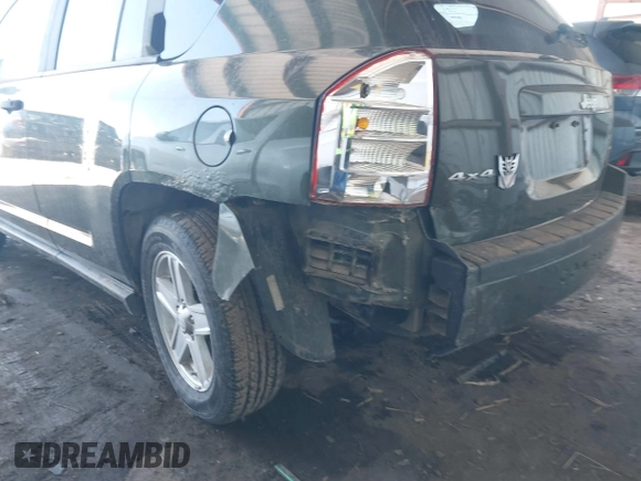 2007 Jeep Compass Sport with VIN 1J8FF47WX7D211695, listed as a IAAI auction lot 41839810 with 72,582 mi miles. Bid and sale history available at carsss.com. Image 6.