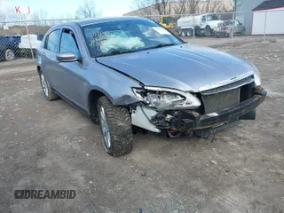 2013 Chrysler 200 Touring with VIN 1C3CCBBBXDN574763, listed as a IAAI auction lot 41882246 with 258,839 mi miles. Bid and sale history available at carsss.com. Image 1.