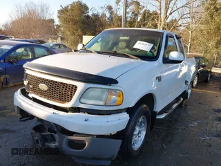 2003 Ford F-150 z VIN 2FTRX08W63CA22223, wystawiony jako IAAI lot #41382377 z przebiegiem 261 841 mil mil oraz . Historia ofert i sprzedaży dostępna na DreamBid. Obrazek 17.