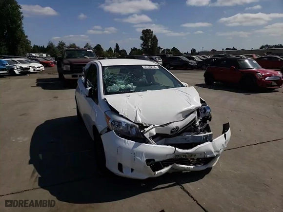 2014 Toyota Yaris L with VIN JTDJTUD39ED597169, listed as a Copart auction lot 65620184 with 0 mi miles and Salvage Title. Bid and sale history available at carsss.com. Image 11.