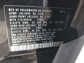 2012 Volkswagen Tiguan LE z VIN WVGAV7AX8CW531387, wystawiony jako IAAI lot #41603812 z przebiegiem 154 147 mil mil oraz . Historia ofert i sprzedaży dostępna na DreamBid. Obrazek 9.