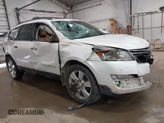 2014 Chevrolet Traverse LTZ z VIN 1GNKVJKD8EJ235688, wystawiony jako IAAI lot #41900652 z przebiegiem 171 152 mil mil oraz . Historia ofert i sprzedaży dostępna na DreamBid. Obrazek 1.