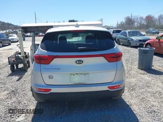 2019 Kia Sportage LX z VIN KNDPM3AC4K7591148, wystawiony jako IAAI lot #41826009 z przebiegiem Nie podano mil oraz . Historia ofert i sprzedaży dostępna na DreamBid. Obrazek 16.