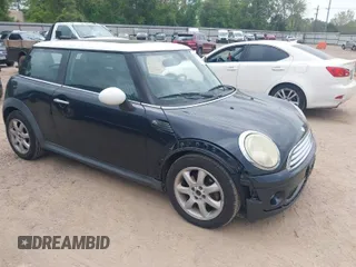 2009 MINI Cooper Hardtop with VIN WMWMF33559TU70378, listed as a IAAI auction lot 41937204 with 111,413 mi miles. Bid and sale history available at carsss.com. Image 1.