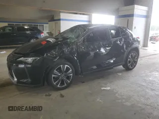 2022 Lexus UX 200 с VIN JTHX3JBH2N2050696, выставлен на аукционе Copart как лот 55606485 с пробегом 52 661 миль миль и Списание • Salvage title. История ставок и продаж доступна на DreamBid. Изображение 1.