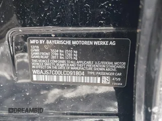 2020 BMW 5 Series M550i xDrive with VIN WBAJS7C00LCD91804, listed as a IAAI auction lot 41590368 with Not provided miles and . Bid and sale history available at DreamBid. Image 9.